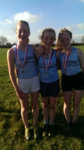 Sara Barry, Laura Hayes & Caoimhe Hayes who took 1st three places in the U-15 Girls, 3500m race.